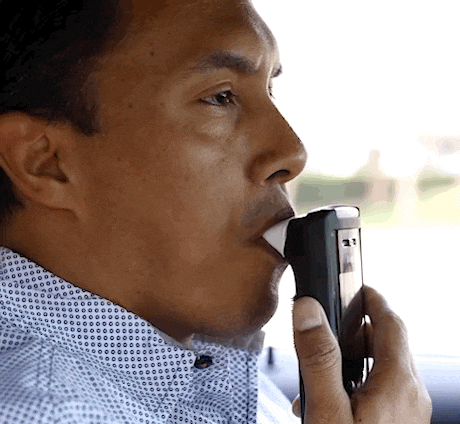 Young man using an interlock device, what is an ignition interlock device